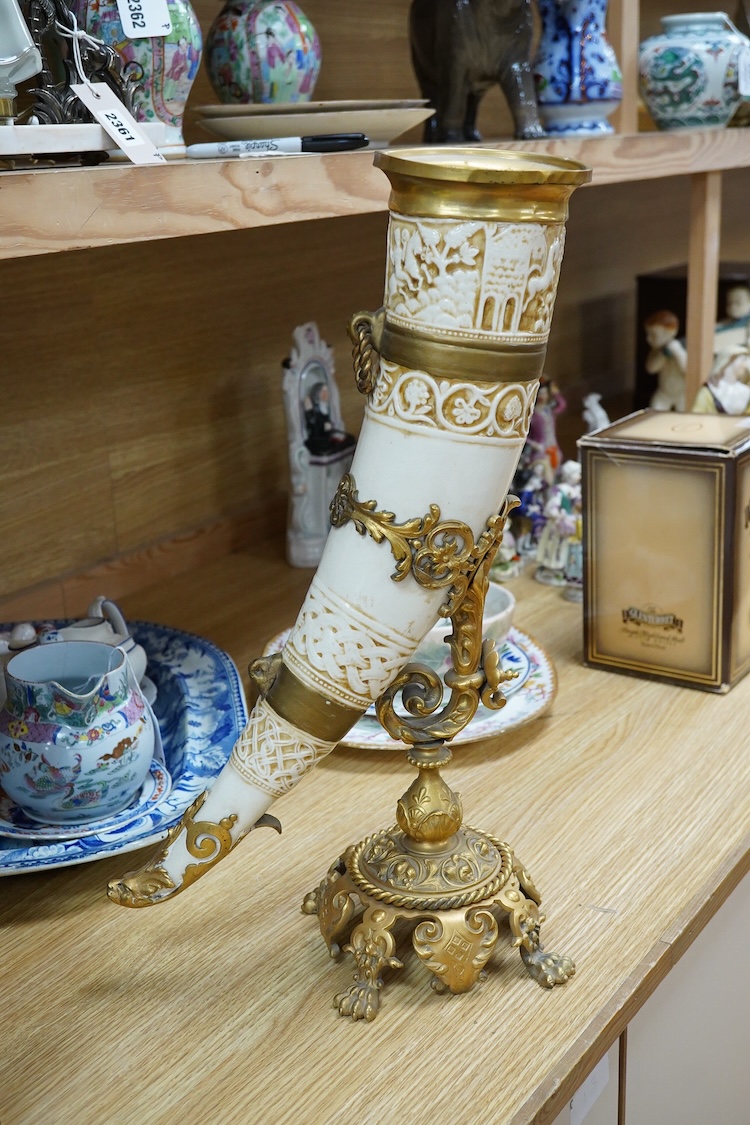 A late 19th century Viennese ormolu mounted ceramic drinking horn vase, 47cm high